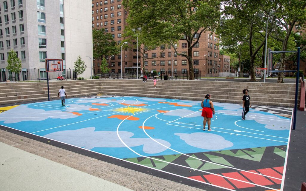 The newly upgraded basketball court features art designs created by Sophia Dawson.